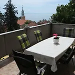 Komel Опатия